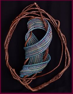 Aquamarine, a whimsical wallhanger by master basket weaver Tina Puckett