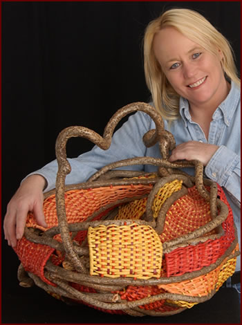 Tina Puckett holding her basket Dragon Pouch